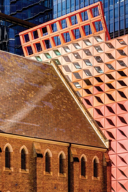 The colour of the roof, inspired by local flora, contrasts with the surrounding towers while respecting the nearby historic buildings. Image: Brett Boardman
